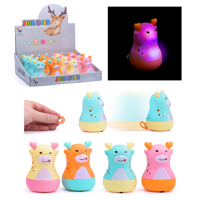 Заводная игрушка 2226-A12 "Игривая коровка " с подсветкой, в коробке