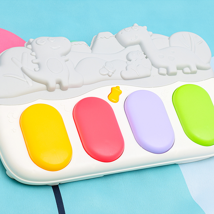 Фото к товару Коврик развивающий 368-70H "Динозаврик" с пианино, в коробке Коврик развивающий 368-70H "Динозаврик" с пианино, в коробке